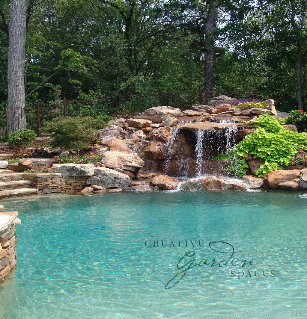 Creative Garden Spaces Inc, Winston-Salem NC, pool waterfall, natural waterfall, water feature, pool fountain, landscape boulders, custom stonework